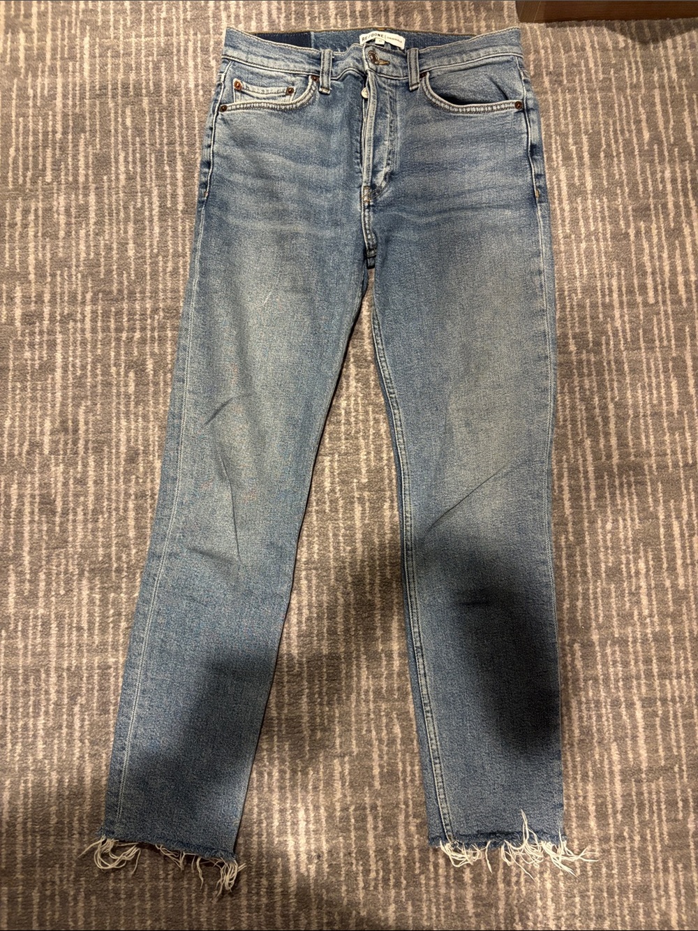Re/Done Women's Light Wash Skinny Jeans with Frayed Hem